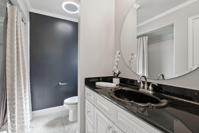 bathroom with tile patterned floors, ornamental molding, toilet, and vanity