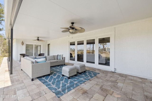 view of patio featuring ceiling fan and outdoor lounge area