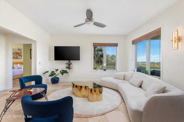 living room with ceiling fan