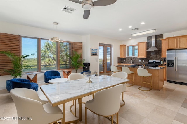 dining area featuring ceiling fan