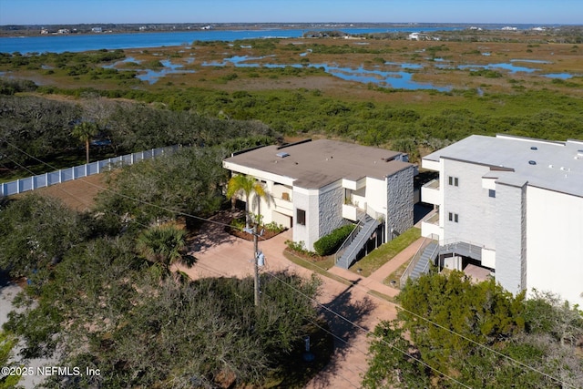 bird's eye view with a water view