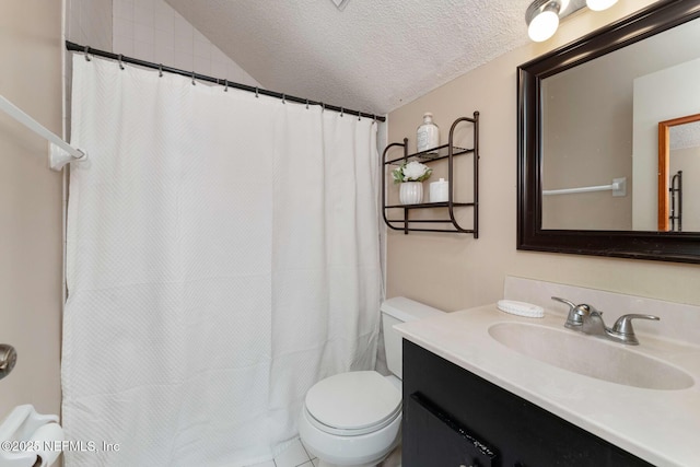 bathroom featuring lofted ceiling, vanity, toilet, and a textured ceiling