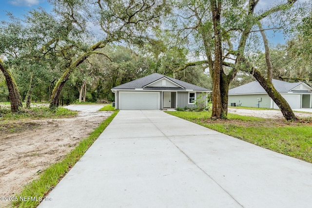 single story home featuring a garage