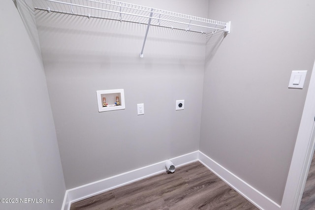 laundry area featuring electric dryer hookup, washer hookup, and hardwood / wood-style flooring