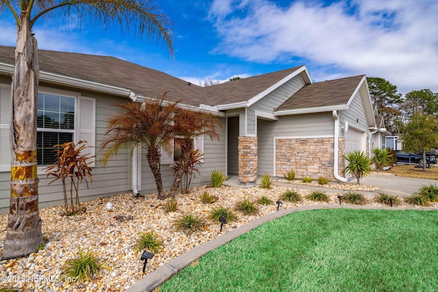 ranch-style home featuring a garage