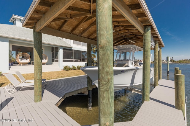 view of dock with a water view