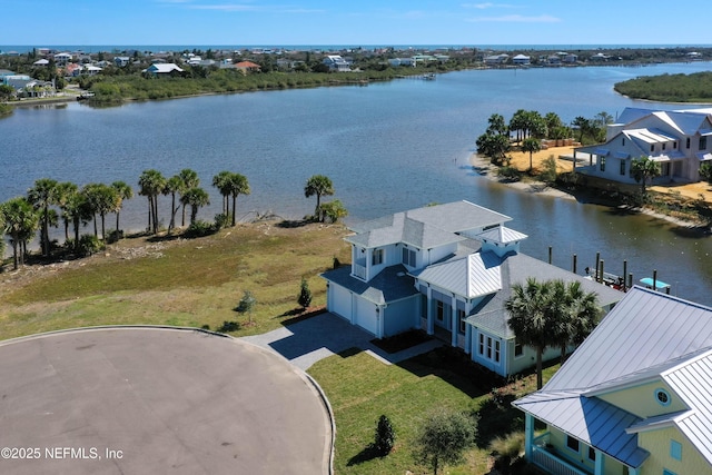 drone / aerial view featuring a water view