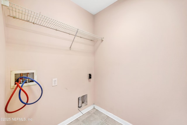 laundry room featuring washer hookup, hookup for an electric dryer, and light tile patterned floors