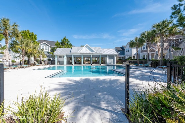 view of pool featuring a patio area