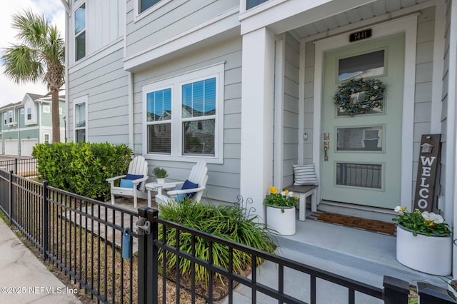 entrance to property with covered porch