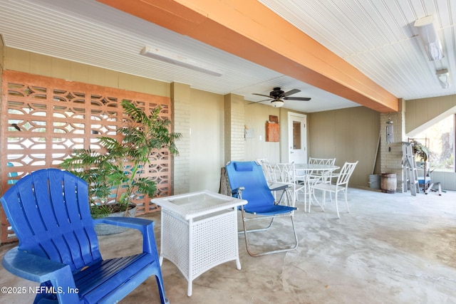 view of patio featuring ceiling fan