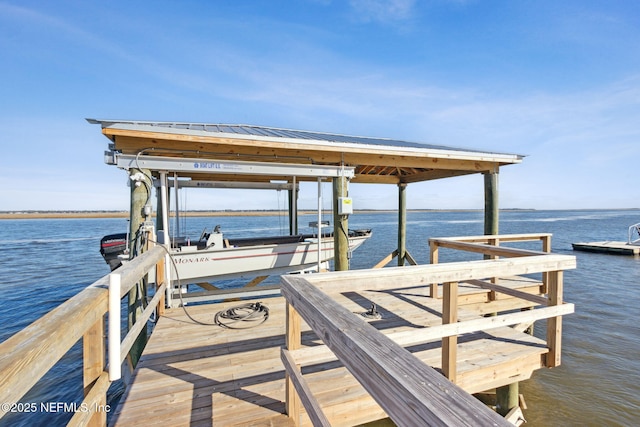 view of dock featuring a water view