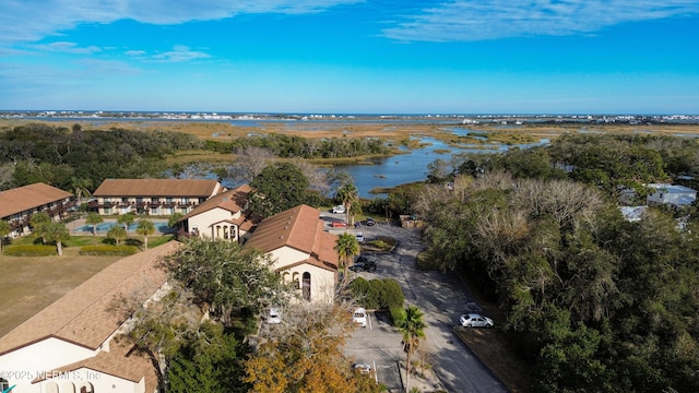 drone / aerial view with a water view