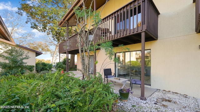 rear view of house with a patio