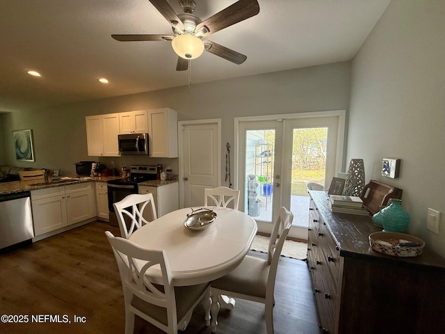 dining space featuring french doors, dark wood-style flooring, a ceiling fan, and recessed lighting