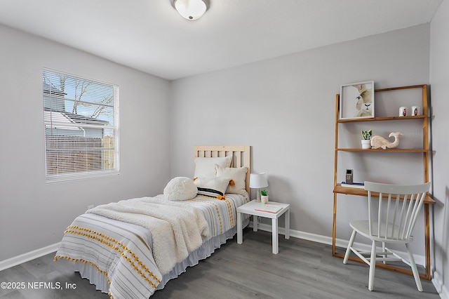 bedroom with wood-type flooring