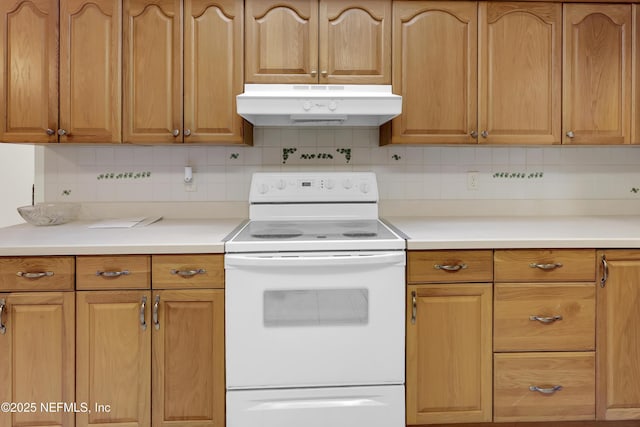 kitchen featuring white electric range and decorative backsplash