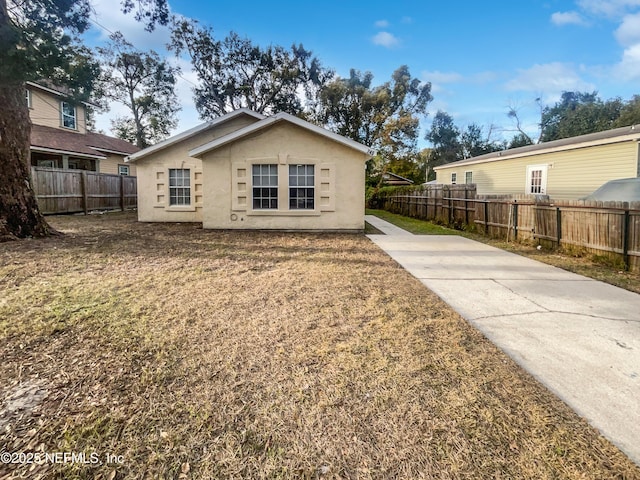 exterior space with a yard