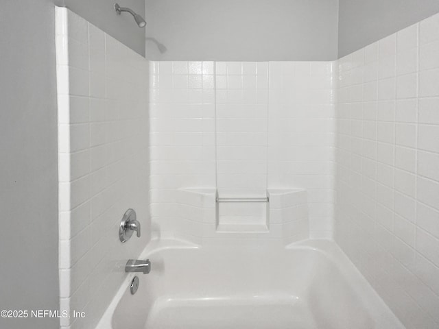 bathroom featuring shower / bath combination