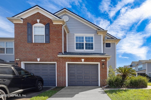 view of front of home with a garage