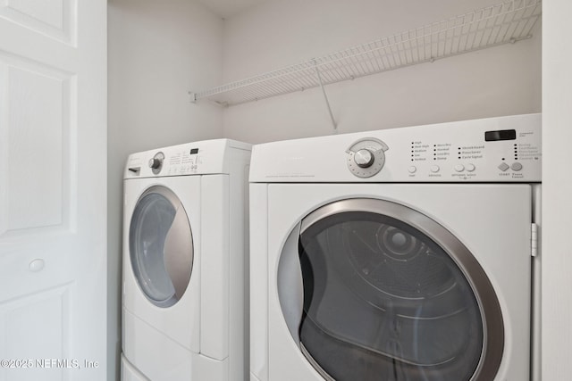 washroom with separate washer and dryer