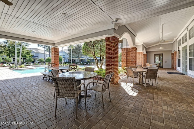 view of patio featuring ceiling fan