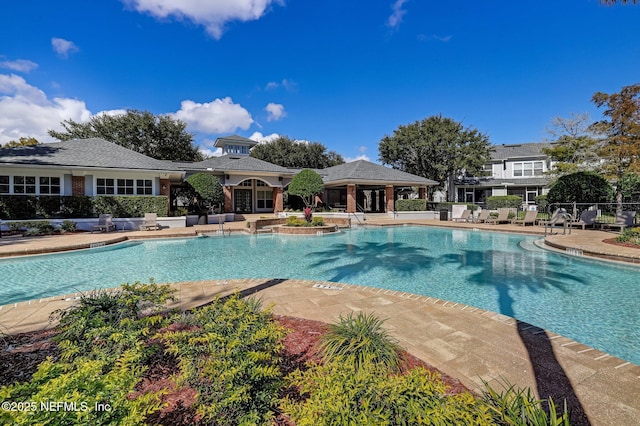 view of swimming pool featuring a patio