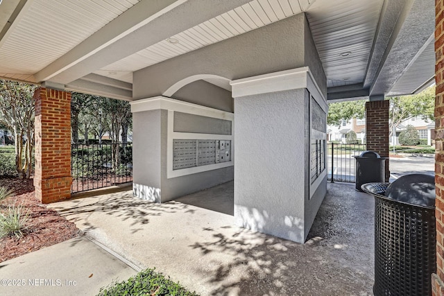 view of patio / terrace featuring a mail area