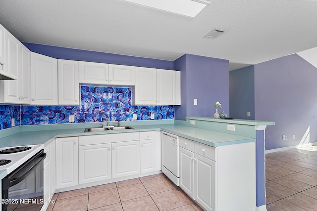 kitchen featuring sink, white cabinetry, white dishwasher, light tile patterned flooring, and kitchen peninsula