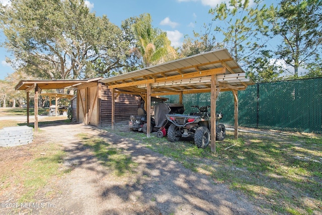 view of parking featuring a carport