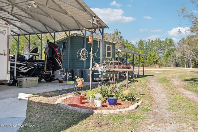 view of home's exterior featuring a carport