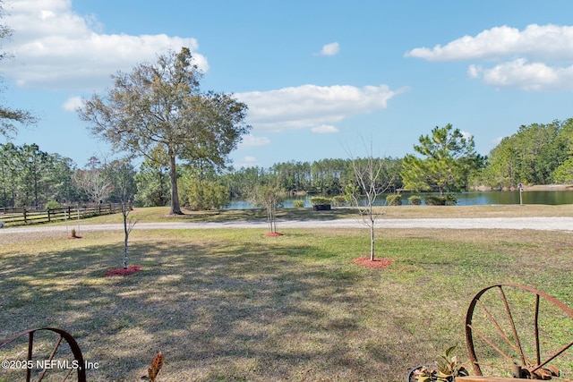 view of yard with a water view