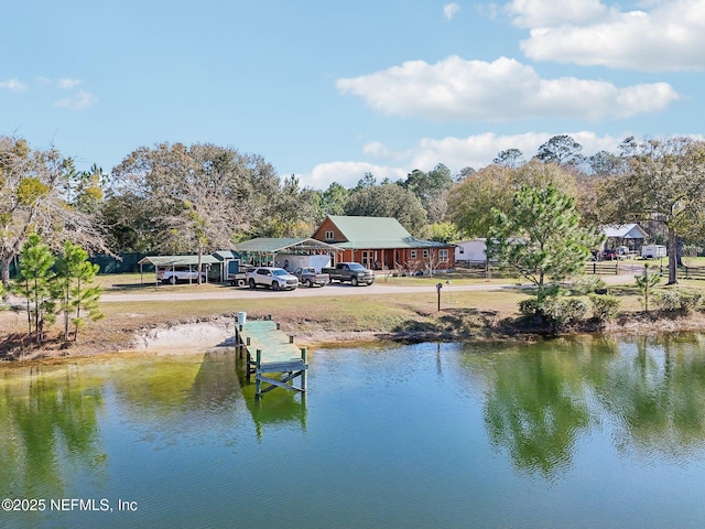 dock area with a water view