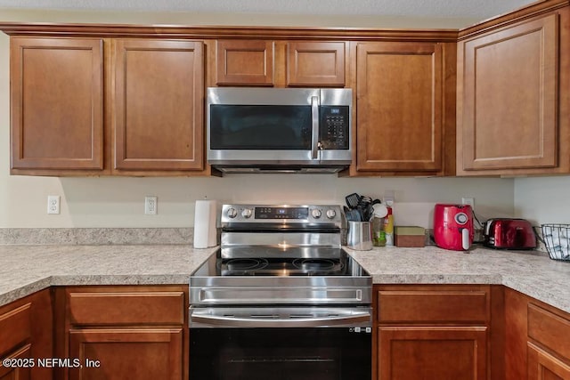 kitchen featuring appliances with stainless steel finishes