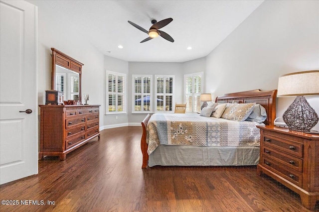 bedroom with dark hardwood / wood-style floors and ceiling fan