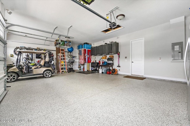 garage featuring a garage door opener