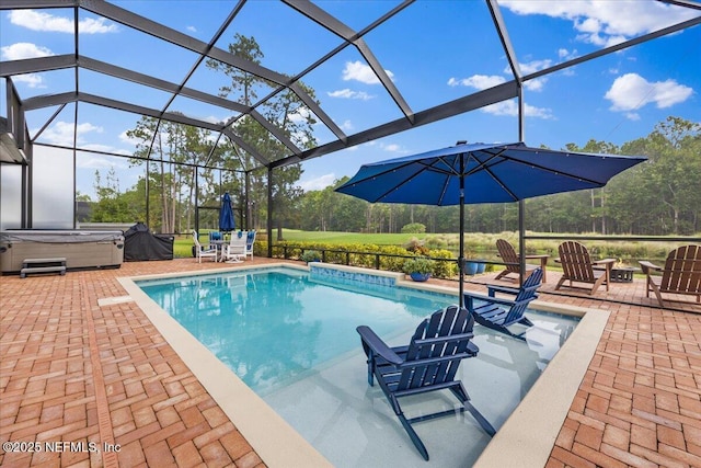 view of pool with a grill, a lanai, a patio area, and a hot tub