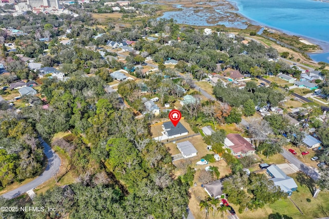 aerial view featuring a view of the beach and a water view