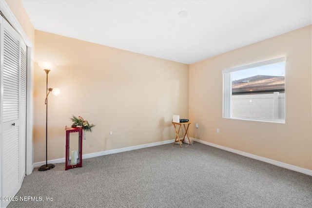 view of carpeted spare room