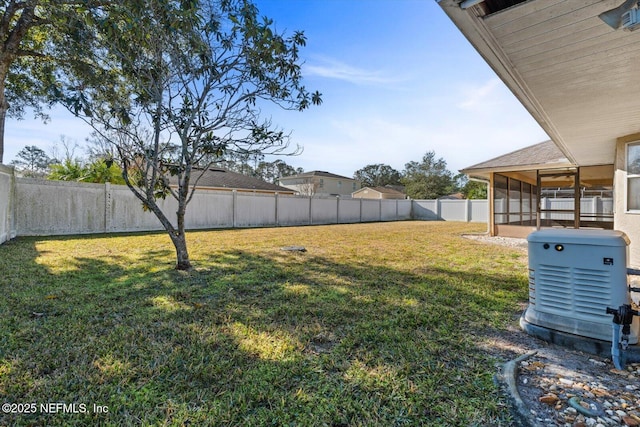 view of yard featuring a sunroom