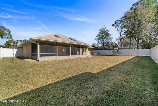 view of yard with a sunroom