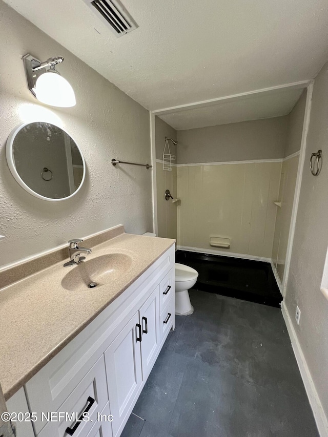 full bathroom featuring bathtub / shower combination, vanity, and toilet