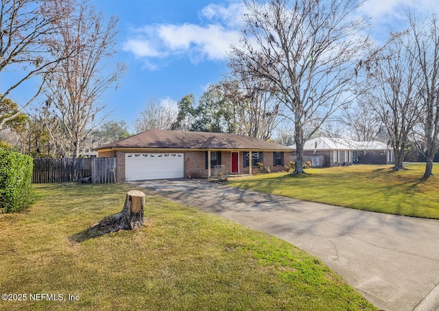 single story home with a garage and a front lawn