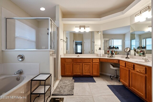 bathroom with vanity, shower with separate bathtub, and tile patterned flooring