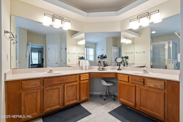 bathroom with vanity, an enclosed shower, and tile patterned floors