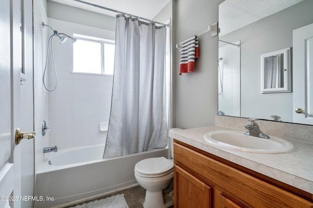 full bathroom featuring shower / tub combo with curtain, vanity, and toilet