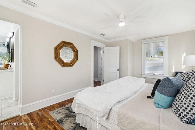 bedroom featuring crown molding, ceiling fan, and dark hardwood / wood-style floors