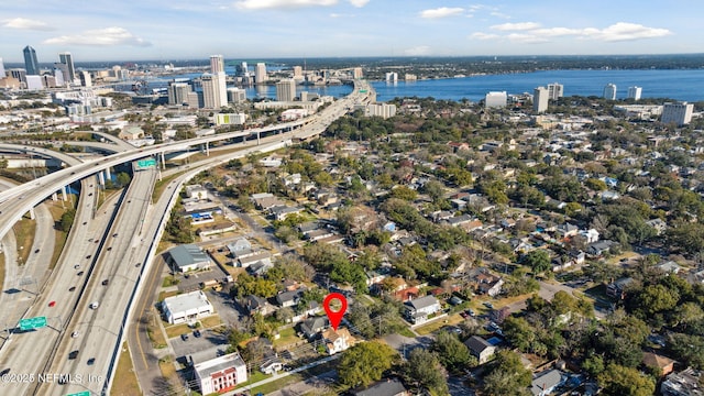 birds eye view of property featuring a water view