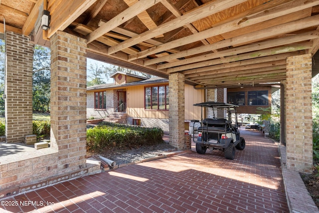 view of patio / terrace with a carport