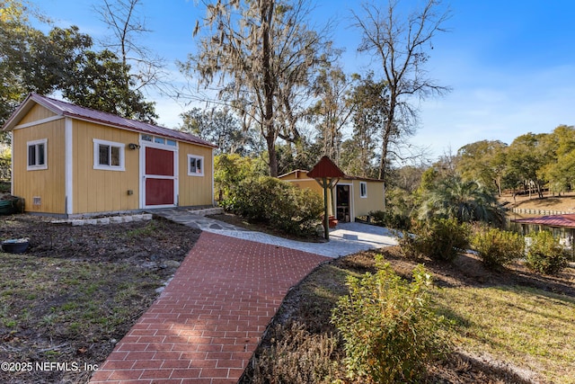 exterior space with an outbuilding